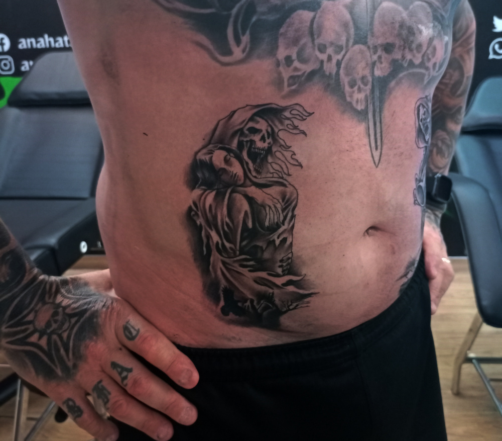 Anahata Ink Tattoo Kuta Bali - Skull Tattoos on Belly