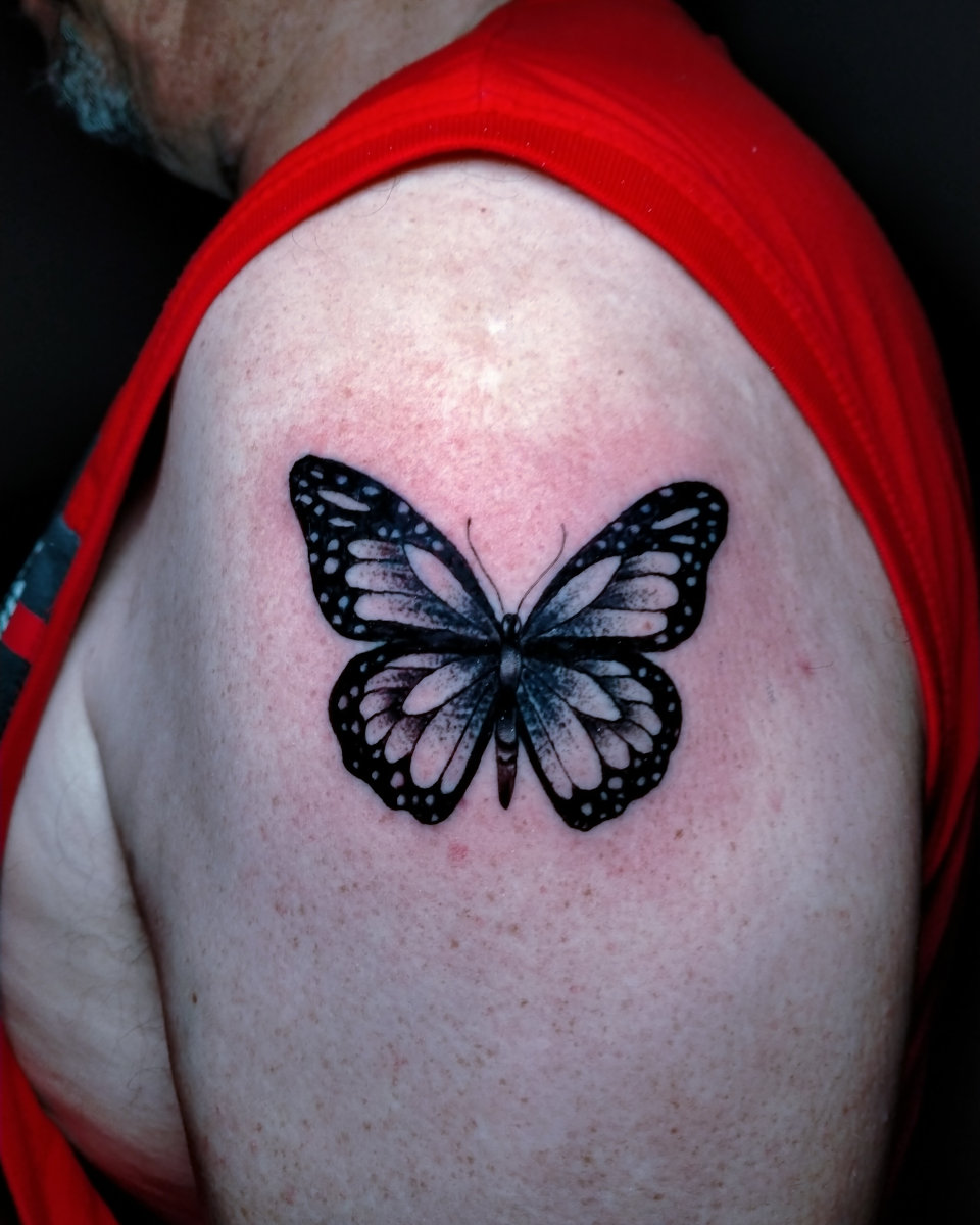 Anahata Ink Tattoo Kuta Bali - Small Black Butterfly Tattoo