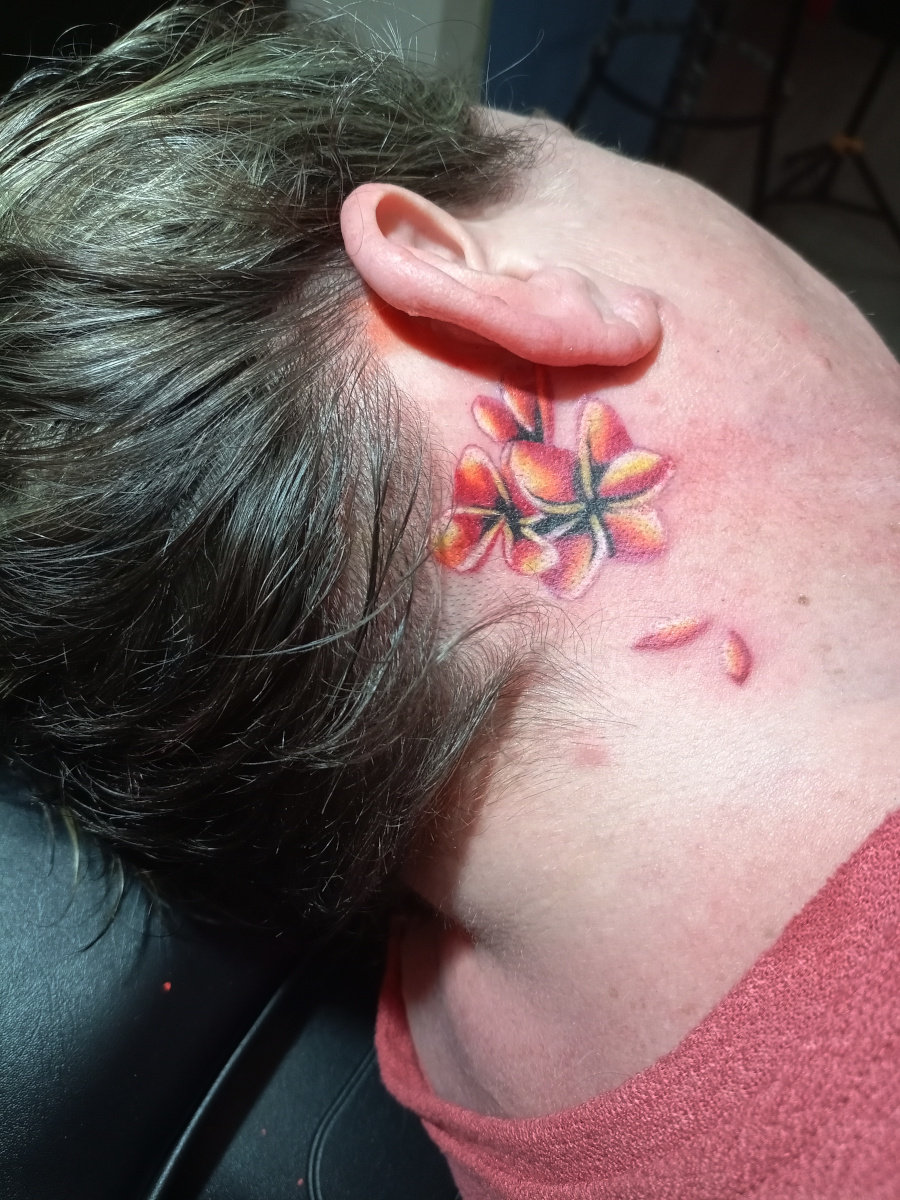 Anahata Ink Tattoo Kuta Bali - Color Tattoo of frangipani or Bali flower