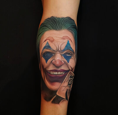 Anahata Ink Tattoo Kuta Bali - Lower Arm Sleeve Joker Tattoo in Color